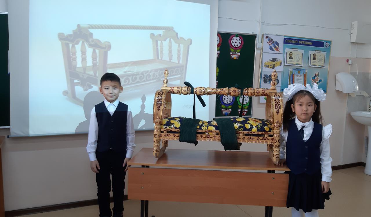 1 "Г" сыныбында "Бесік жыры.Тасымал" тақырыбында сабақ өткізді